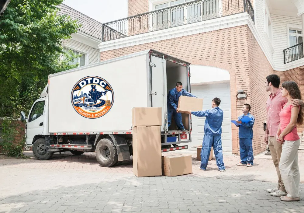 DTDC Packers and Movers team packing household goods in Delhi NCR
